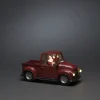Led pick-up truck met kerstman als chauffeur