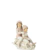 Meisje+jongen op slee w/roze (14x7.5x20.5cm)